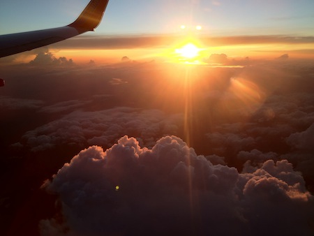 plane-sun-clouds-rf